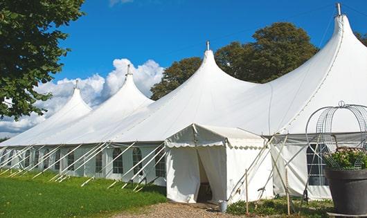 a line of sleek and modern portable toilets ready for use at an upscale corporate event in Olalla